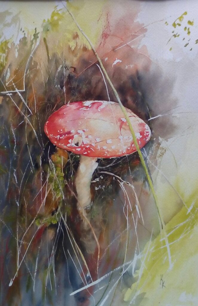 A delicate watercolour painting of a red toadstool, nestled amongst soft grass